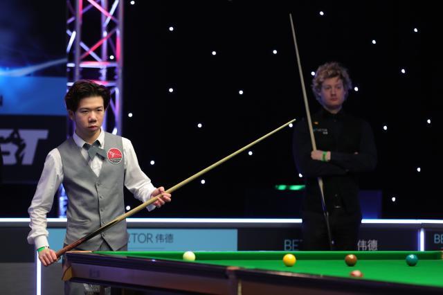 官方网站-直布罗陀赛罗伯逊遭爆冷 中国军团四人全胜晋级